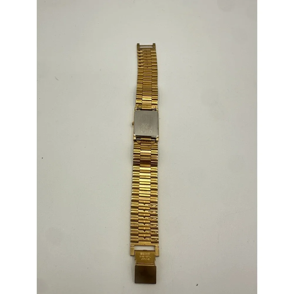 Vintage Seiko Quartz Gold Tone Half Moon  Dress Watch Japan 2100-1680 Unisex